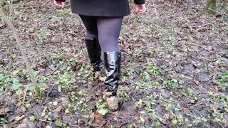 Black knee boots, field and river