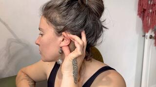 cleaning her dirty ears