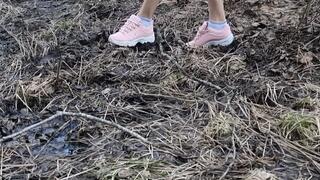 Pink FILA Strada in mud