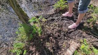 Pink FILA Strada sneakers and white socks muddy