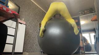 Valeri in yellow leggins ride on physioball