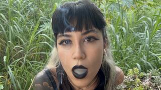 Smoking cigarette in the garden