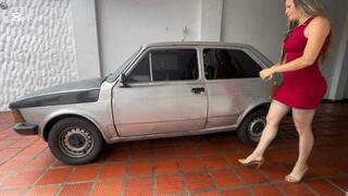 Jarlyn pumps the pedal with high heels to start the old car