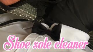 Doormat showing off his ability to clean heel soles