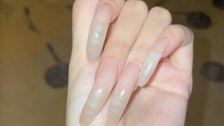 #228 - Very long natural nail showing