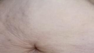 SSBBW flops her big belly on a table