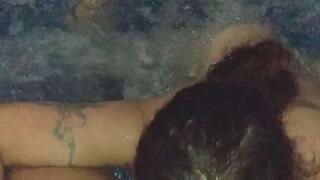 She sucking my pussy and play with my belly button in the jacuzzi
