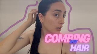 combing my hair before a shower