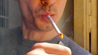 Smoking Muratti Red 100s extreme closeup 190325 4K
