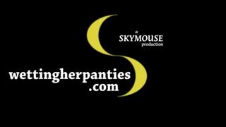 Natalia Forrest is doing squats in the kitchen