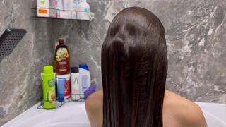 Wet hair covers the face and sticks (fragment of a custom video)