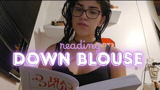 Down blouse while study girl reads with her glasses