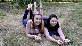 Two pairs of summer young soles of college girls in a public park (Part 6 of 6)