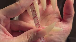 Measuring my super long sharp fingernails