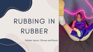 rubbing in rubber apron, boots and gloves