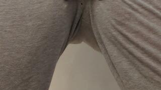 Wetting my sweat pants and showing my pussy