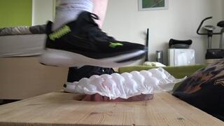 Trampling on air cushions and face in shoes, socks and barefoot