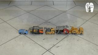 Cars and Trucks under yellow wooden Clogs