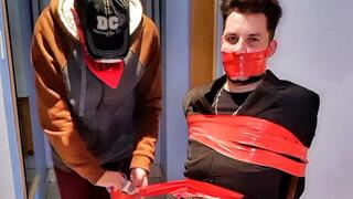 Tonny taped up in the chair