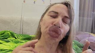 Spit and lick glass with my sexy plump lips
