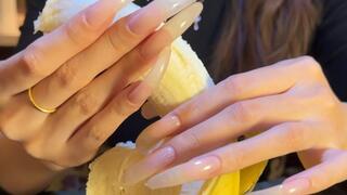 #250 - Banana handjob with very long natural nails