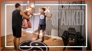 Three sadistic guys spank a slave tied to the ceiling (720p ENG-sub)