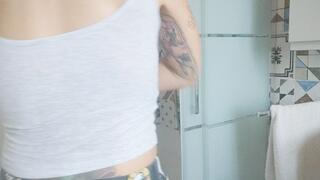 Steam swirled gently through the air as the woman stepped into the shower