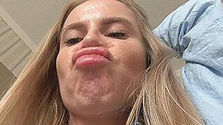 Blondie sniffs her natural plump lips! MP4