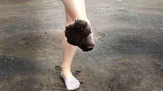 dirty white socks, muddy white socks, wet socks, barefoot in socks outdoor, socks in mud