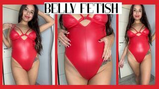 Belly with red latex and nude