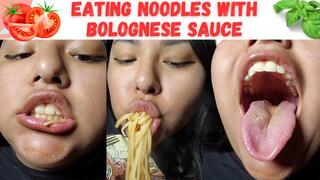 Eating noodles with Bolognese sauce