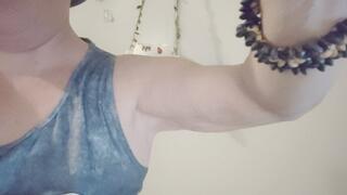 Tempest is flexing biceps and showing injury