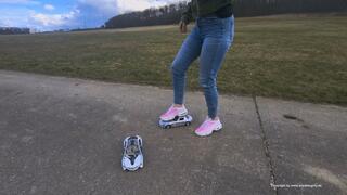 toy car crush in nike TN sneakers