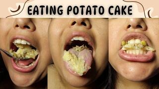 Eating potato cake