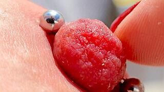 Playing Pierced Nipples Close Up on Balcony