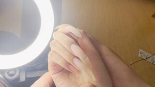 #258 - Admiring my bare nails under the light