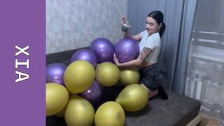Xia smokes a lot of cigarettes without stopping and pops them balloons