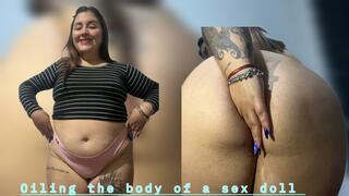Oiling up curvy sex doll