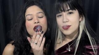 Two Brazilian Goddesses smoking cigarettes together