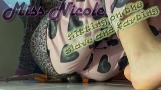 Sitting on the slave and farting