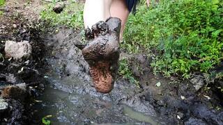 muddy barefoot girl, girl walking barefoot in mud, muddy feet, dirty feet, girl in mud