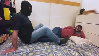 Sitting on his feet I wait for his moans