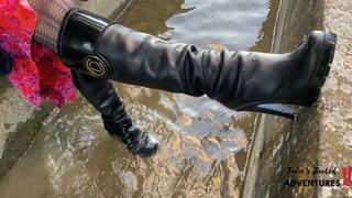 High heeled leather boots in the canal