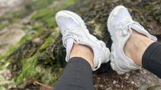 White Nike sneaker beach walk