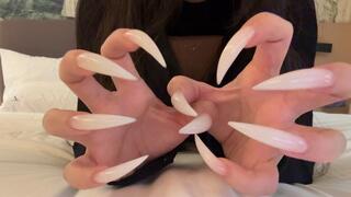Crawling on your bed with my long sexy natural claws