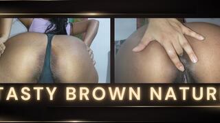 Spreading ass and winking dark brown asshole