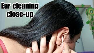 Ear cleaning closeup