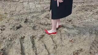 Louboutin in deep mud, louboutin stuck in mud and ground, high heels wrecked in puddles