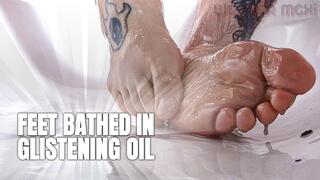 FEET BATHED IN GLISTENING OIL