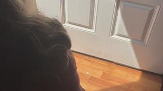 Pissing in the trash can with the front door open